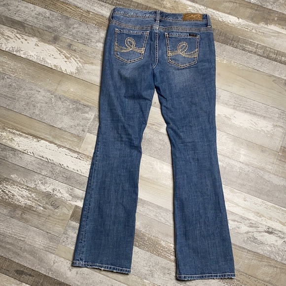 Women's Seven7 Flare Leg Factory Distressed Jeans - Picture 10 of 12